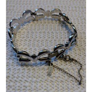 Monet Silver Tone  Bow Ribbon Charm Bracelet 7.5" with Security Chain
